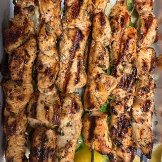 ATHENS Catering Combination choice HALF trays 1 protein, 1 salad, 1 side. Also included with this combination are 1 appetizer side tzatziki and  8 pitas cut at 6 at no extra cost